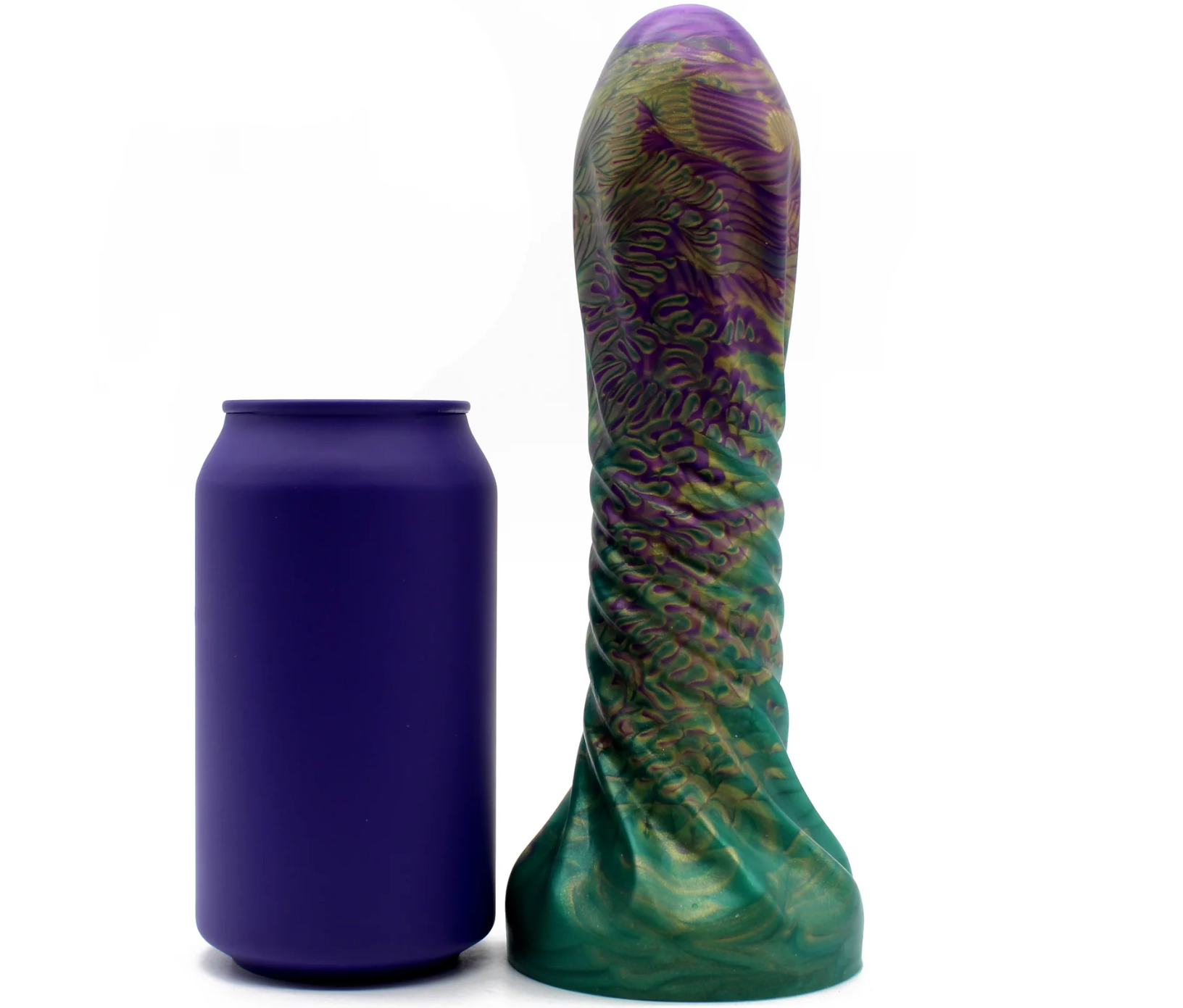 A novelty silicone dildo standing upright next to a dark purple cylindrical cup, shown on a clean white background.