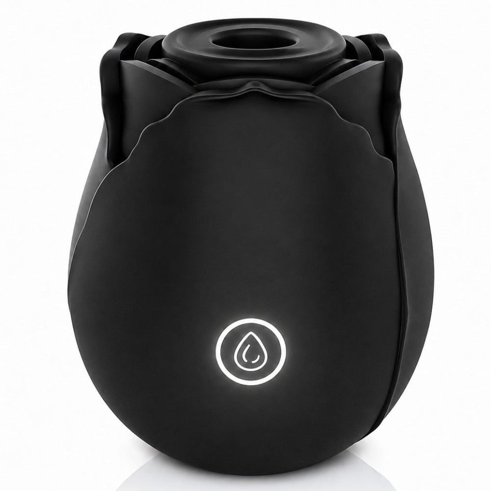 Nexus Vibe Petalpulse black silicone vibrating rose airpulse suction toy from the side, with power button lit up