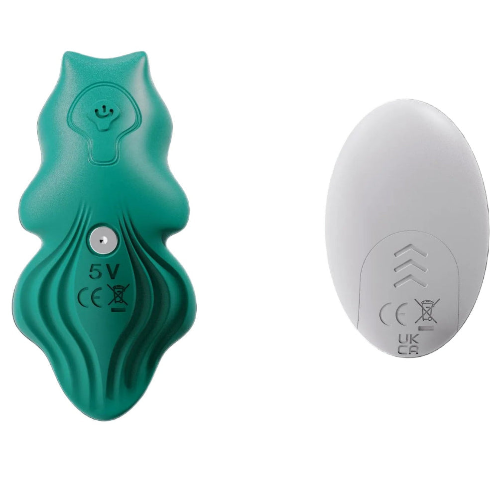 Green Flutter silicone remote control panty vibe from the back to show power button and charging port, with remote from the back to show battery area