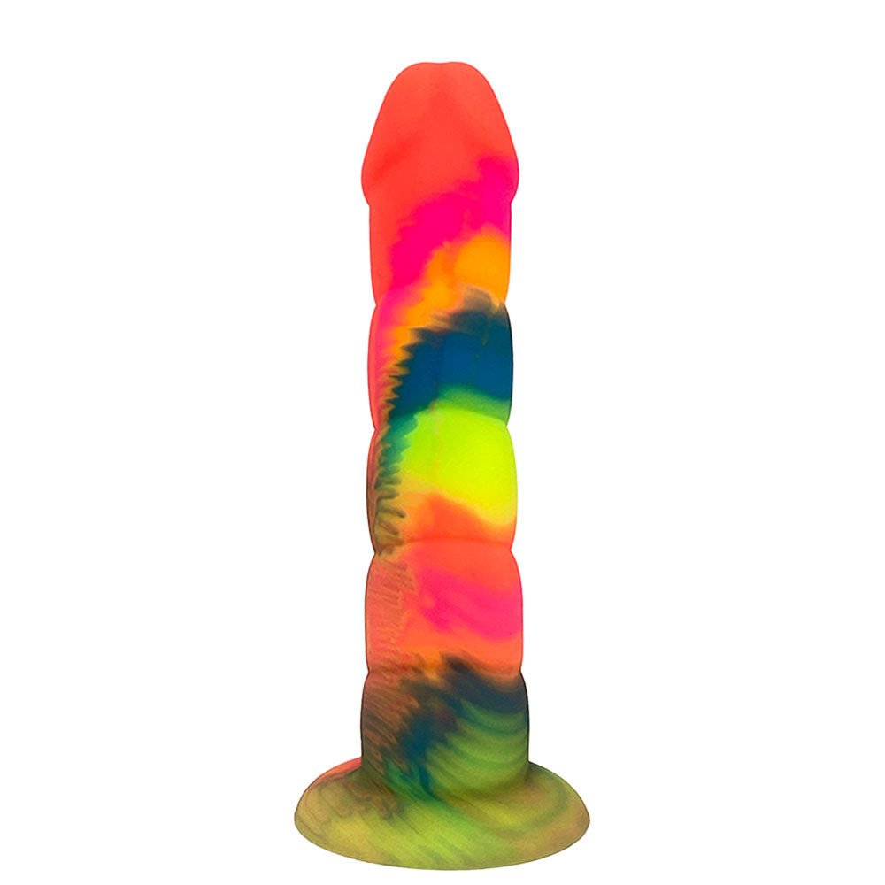 Nexus Loli 6 inch silicone horn dildo in rainbow tie dye colors, flat on its base, from under the shaft