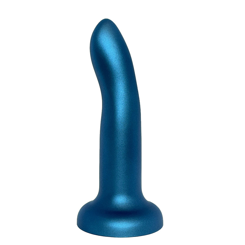 Nexus 6 inch rory silicone dildo in midnight blue metallic, sitting flat on its suction base with g spot curve facing the viewer's left