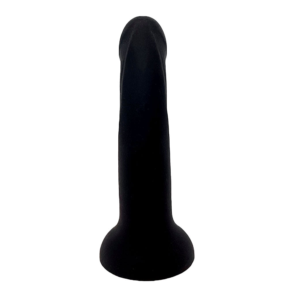 Nexus Tease Silicone ribbed matte blck dildo wth suction cup base, flat on its base with the curve and tip facing the rear. View of the shaft from the underneath