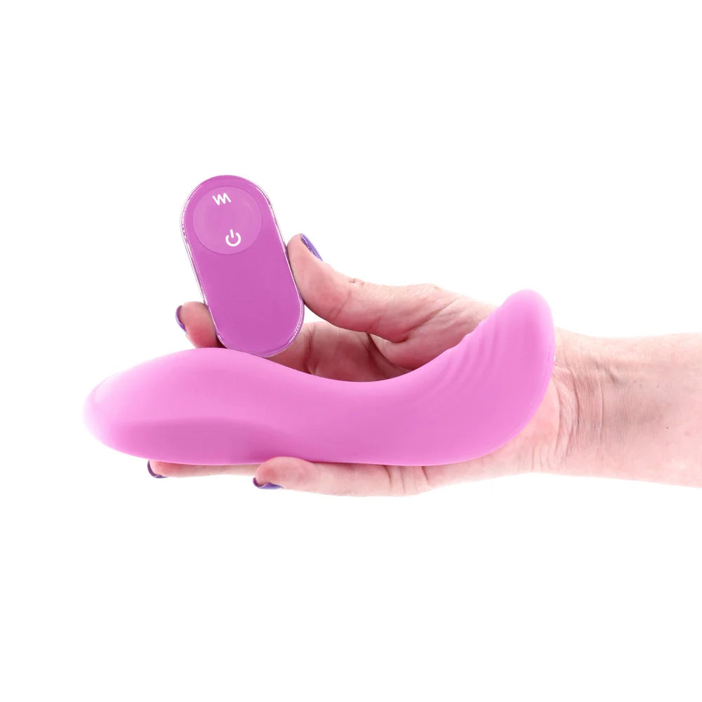 Grinders Rocker vibrating saddle style grinder, with remote control held in a hand