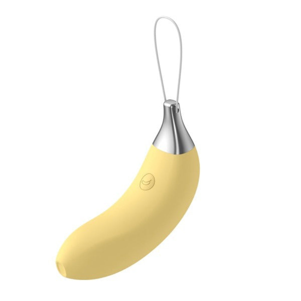 Top banana silicone banana shaped mini vibrator from the side, with power button showing and included wrist strap attached
