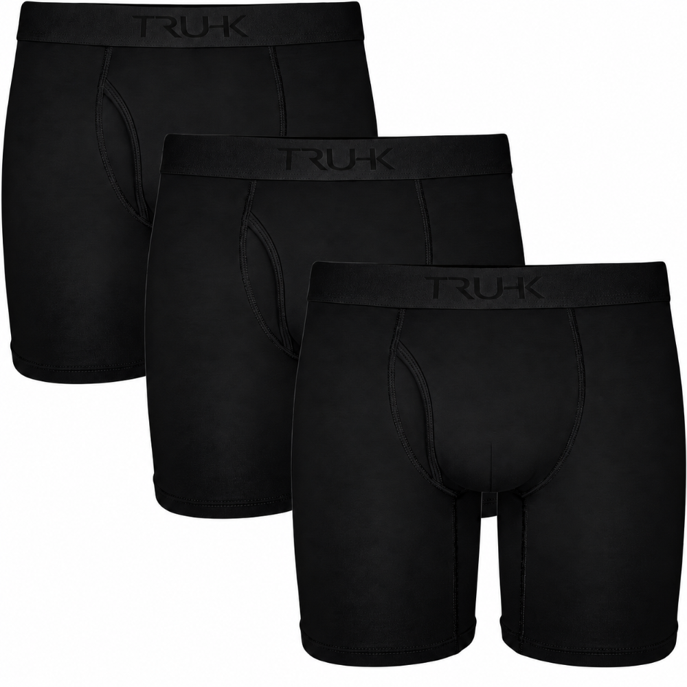 Three pairs of black boxer briefs arranged in a staggered overlapping layout on a plain white background. The brand name 'TRUHK' is subtly embossed on the waistband of each pair.